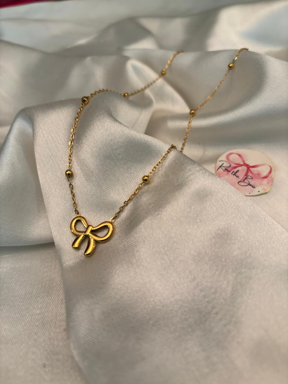 Golden Bow Pendant