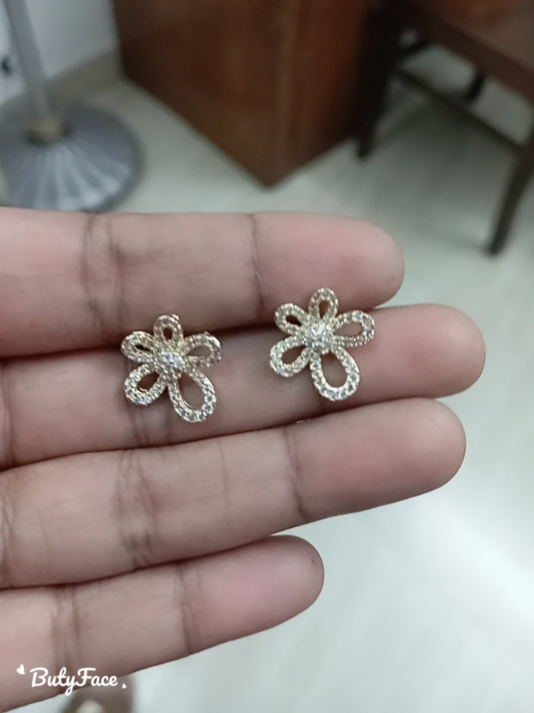 Tiny penta petal floral golden earring