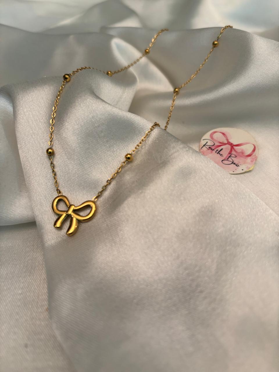 Golden Bow Pendant