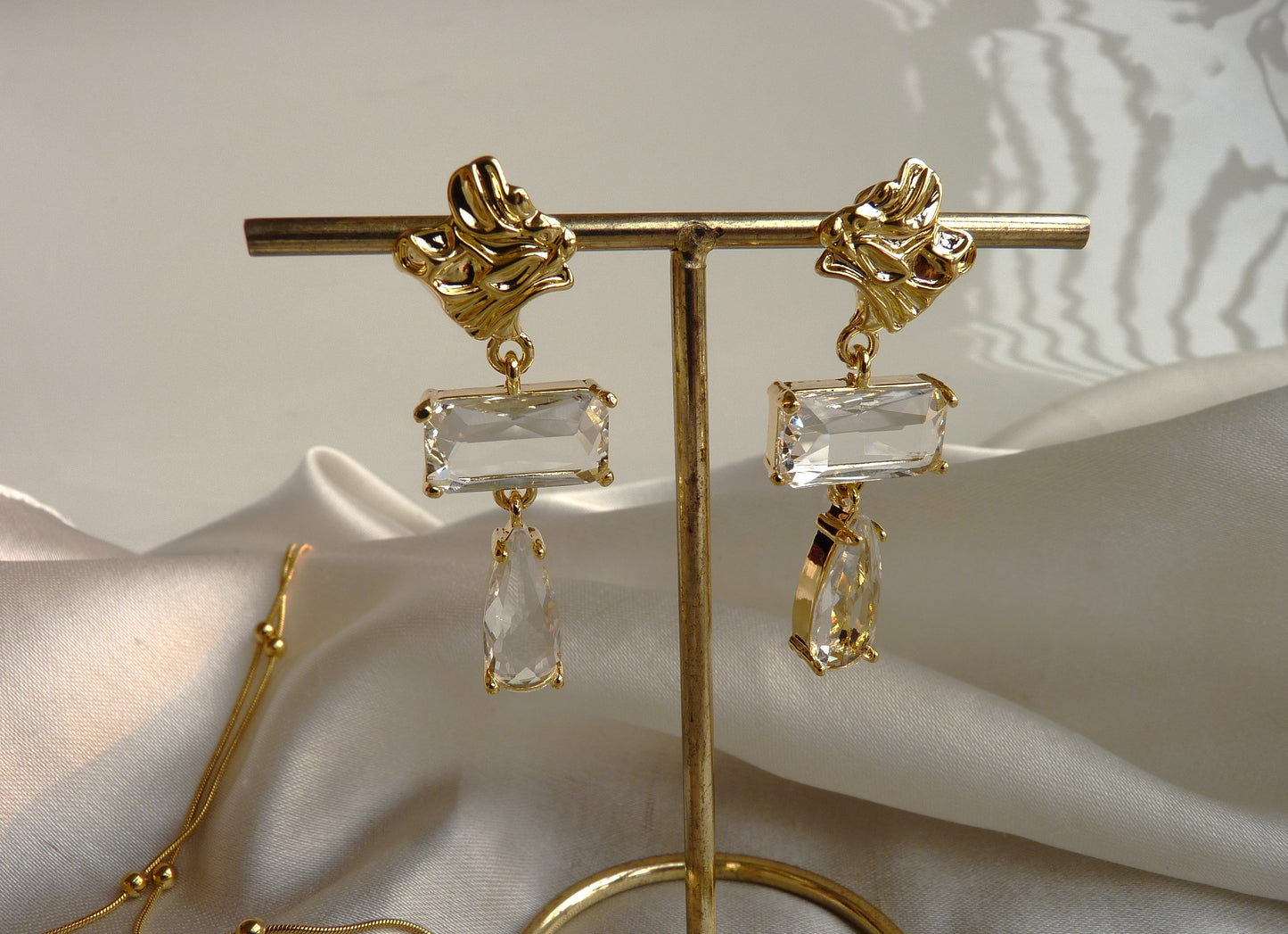Golden drop down earring