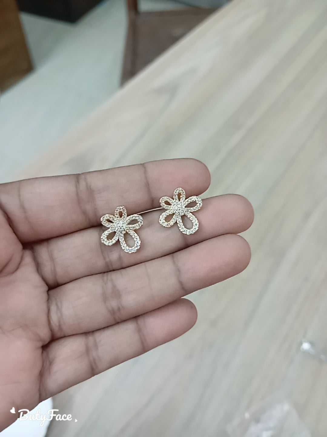 Tiny penta petal floral golden earring